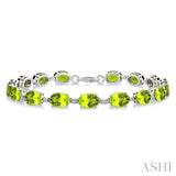 7X5 MM Oval Shape Peridot and 1/10 Ctw Single Cut Diamond Semi-Precious Bracelet in Sterling Silver