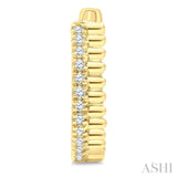 1/10 Ctw Fluted Round Cut Diamond Pirouette Petite Huggie Earrings in 10K Yellow Gold