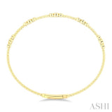 1/2 Ctw Three Stone Bezel Set Round Cut Diamond Flex Bangle in 14K Yellow Gold