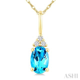 1/50 Ctw Oval Cut 6X4 MM Blue Topaz and Round Cut Diamond semi-precious Pendant With Chain in 10K Yellow Gold