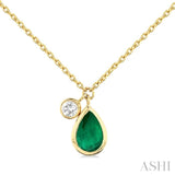 6x4 MM Pear Cut Emerald and 1/20 Ctw Bezel Set Round Cut Diamond Precious Pendant With Chain in 14K Yellow Gold