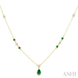 6X4 MM & 2 MM Pear and Round Shape Emerald and 1/6 Ctw Round Cut Diamond Drop Necklace in 14K Yellow Gold