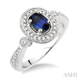 6x4 MM Oval Cut Sapphire and 1/5 ctw Round Cut Diamond Ring in 14K White Gold