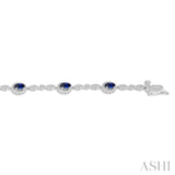 5x3 MM Oval Cut Sapphire and 1/20 Ctw Round Cut Diamond Bracelet in 10K White Gold