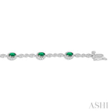 5x3 MM Oval Cut Emerald and 1/20 Ctw Round Cut Diamond Bracelet in 14K White Gold