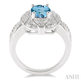 9x7 MM Oval Cut Blue Topaz and 1/50 ctw Single Cut Diamond Ring in Sterling Silver