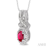 5x3 MM Oval Cut Ruby and 1/50 ctw Single Cut Diamond Pendant in Sterling Silver with Chain