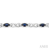 5x3 MM Oval Cut Sapphire and 1/10 Ctw Round Cut Diamond Bracelet in 10K White Gold