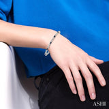 5x3 MM Oval Cut Sapphire and 1/10 Ctw Round Cut Diamond Bracelet in 10K White Gold