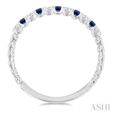 1.75 MM Sapphire and 1/6 Ctw Round Cut Diamond Precious Wedding Band in 14K White Gold