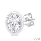 1/5 ctw Petite Bezel Set Oval Cut Diamond Fashion Stud Earring in 10K White Gold