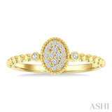 1/8 Ctw Petite Bead Shank Oval Center Round Cut Bead Bijoux Diamond Fashion Ring in 10K Yellow Gold
