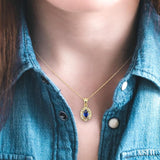 5x3 MM Oval Shape Sapphire and 1/20 ctw Single Cut Diamond Pendant in 10K Yellow Gold with Chain