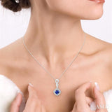 4x4 MM Cushion Shape Sapphire and 1/10 ctw Round Cut Diamond Pendant in 14K White Gold with Chain