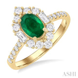 7x5 MM Oval Cut Emerald & 5/8 ctw Baguette and Round Cut Diamond Halo Precious Ring in 14K Yellow Gold