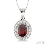 8x6mm Oval Cut Garnet and 1/3 Ctw Round Cut Diamond Pendant in 14K White Gold with Chain