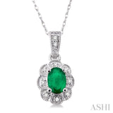 6x4mm Oval Cut Emerald and 1/20 Ctw Single Cut Diamond Pendant in 14K White Gold with Chain