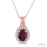 7x5 MM Oval Shape Rhodolite and 1/6 Ctw Round Cut Diamond Pendant in 14K Rose Gold with Chain